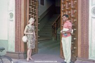 Dick-Dick and Shannon Moeser in front of open door in Zanzibar, July 6, 1964.
