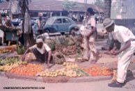 Fruit seller in Zanzibar market, July 6, 1964.